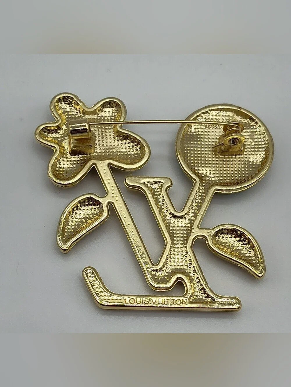 LOUIS VUITTON Crystal LV Flower Brooch GoldTone Turquoise Red Zipper Hardware
